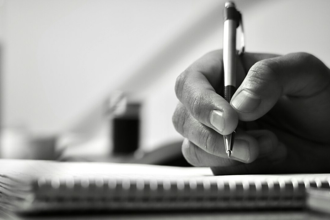 person editing manuscript