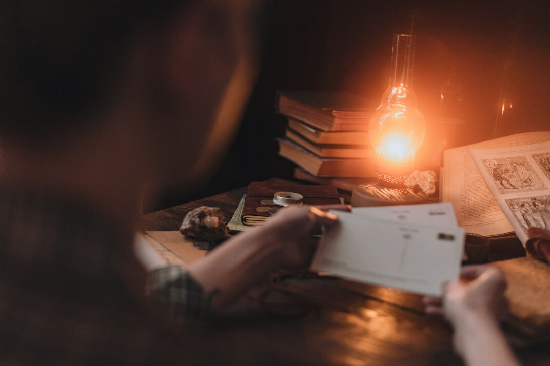 writer reading old documents